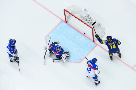 Lucas Raymond of Sweden (not pictured) scores 1-0 behind