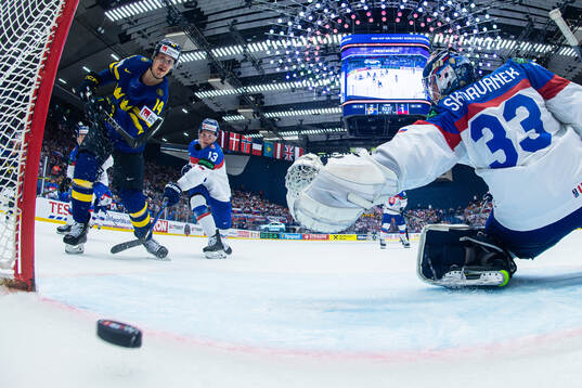 Joel Eriksson Ek of Sweden scores the 6-1 goal behind