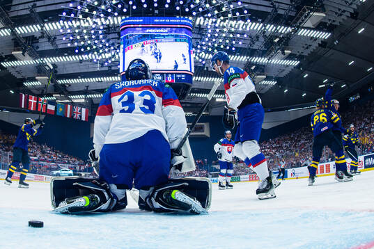 Rasmus Dahlin and Lucas Raymond of Sweden celebrate the 1-0