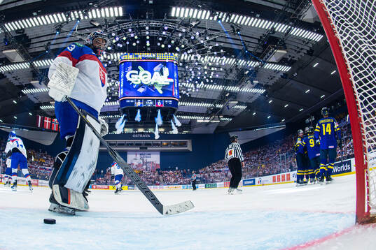 Goaltender Stanislav Skorvanek of Slovakia looks dejected