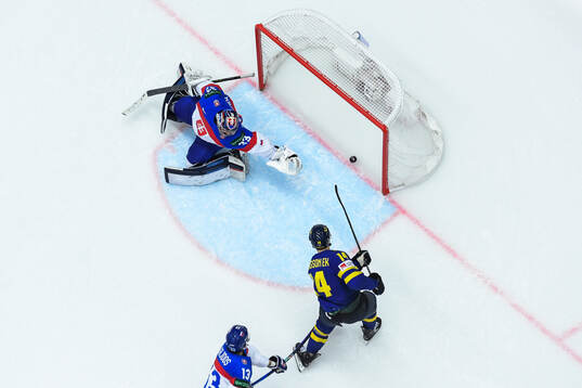 Joel Eriksson Ek of Sweden scores the 6-1 goal behind