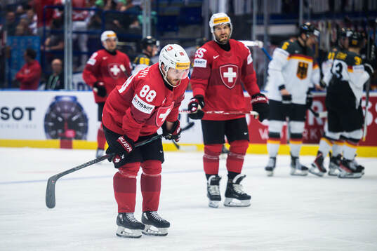 Christoph Bertschy of Switzerland looks dejected