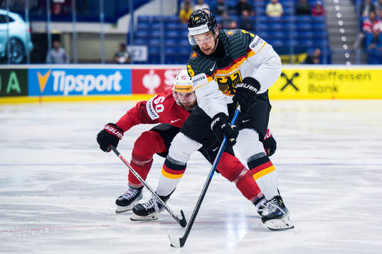 Tristan Scherwey of Switzerland and Kai Wissman of Germany