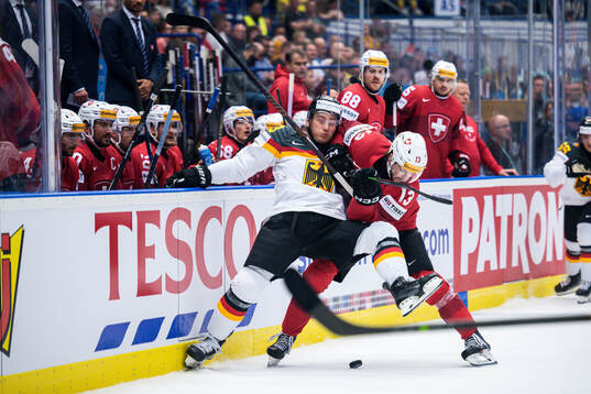 Leonhard Pfoderl of Germany and Nico Hischier of Switzerland