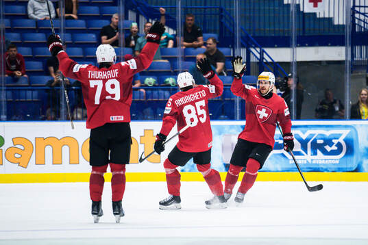 Christoph Bertschy of Switzerland celebrates