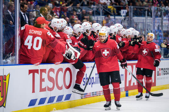 Christoph Bertschy of Switzerland celebrates