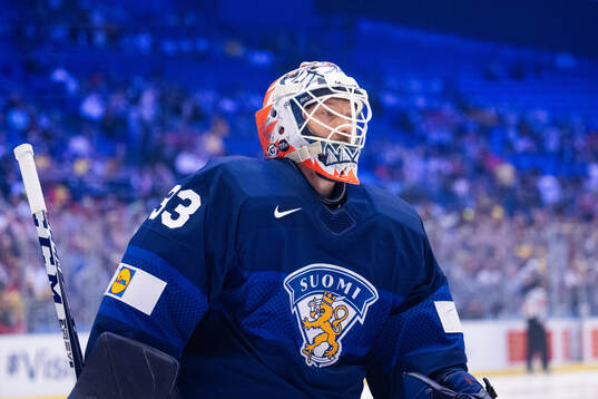 Goaltender Emil Larmi of Finland