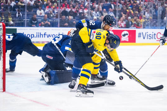 Marcus Johansson of Sweden and Jesper Mattila of Finland