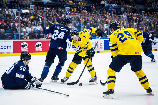 Juuso Riikola and Hannes Björninen of Finland and Lucas