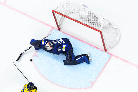 Goaltender Emil Larmi of Finland