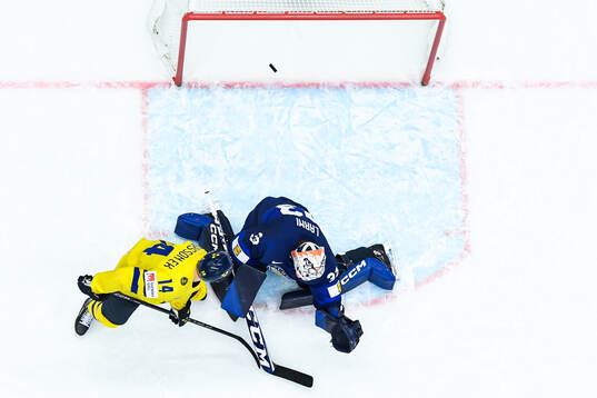 Joel Eriksson Ek of Sweden (not in frame) scores 2-1 behind