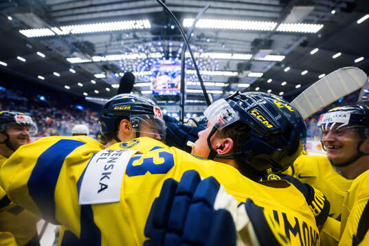 Lucas Raymond and Joel Eriksson Ek of Sweden celebrates