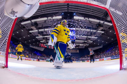 Goaltender Filip Gustavsson of Sweden looks dejected