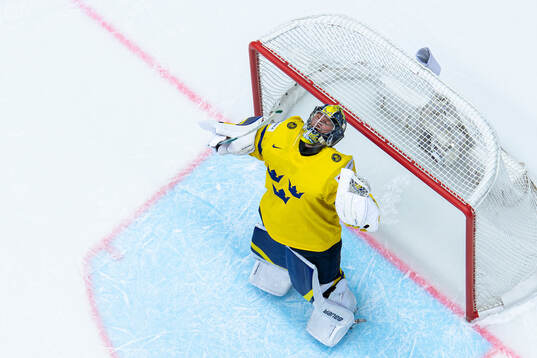 Goaltender Filip Gustavsson of Sweden celebrates the win