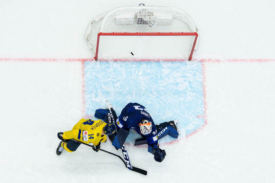 Joel Eriksson Ek of Sweden scores the game winning goal