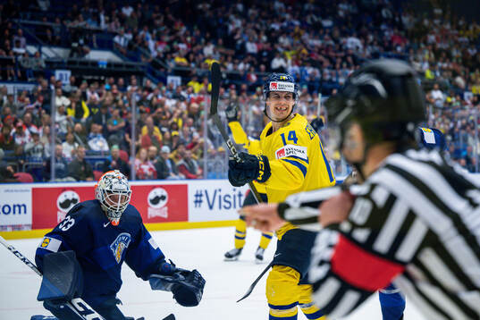 Joel Eriksson Ek of Sweden celebrates scoring the game