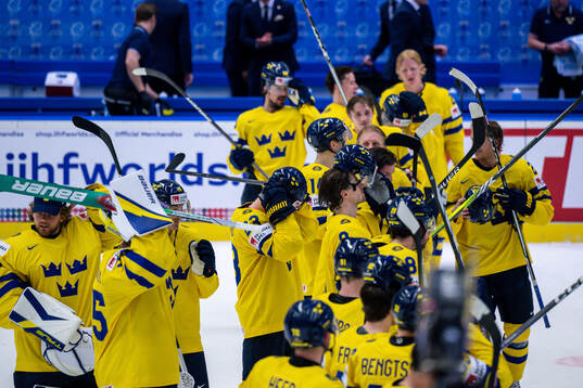 Players of Sweden celebrate