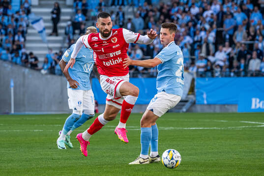 Kalmars Dino Islamovic och Malmö FFs Lasse Berg Johnsen