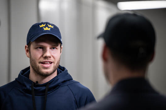 Goaltender Filip Gustavsson of Sweden is interviewed