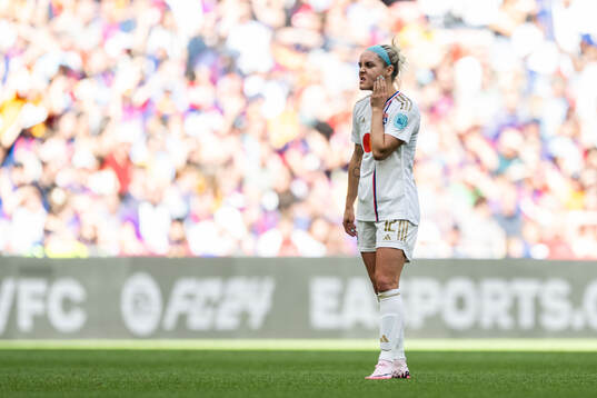 Ellie Carpenter of Lyon looks dejectedduring the UEFA