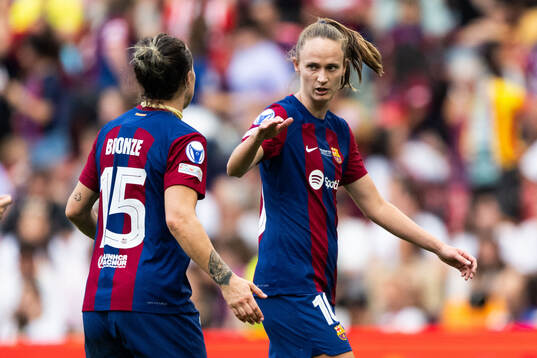 Lucy Bronze and Caroline Graham Hansen of Barcelona