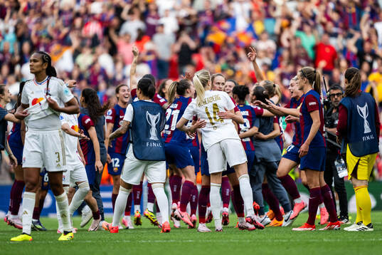 Ada Hegerberg of Lyon and Caroline Graham Hansen of