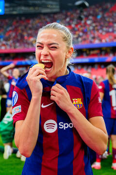 Fridolina Rolfö of Barcelona celebrates with her gold medal