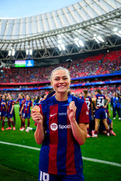 Fridolina Rolfö of Barcelona celebrates with her gold medal