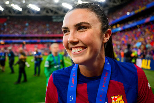 Ingrid Syrstad Engen of Barcelona celebrates with her gold
