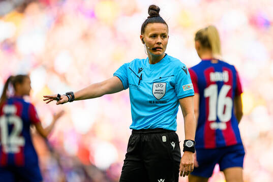Referee Rebecca Welch