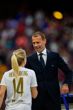 UEFA president Aleksander Ceferin and Ada Hegerberg of Lyon