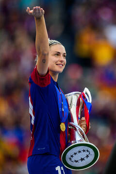 Alexia Putellas of Barcelona with the trophy