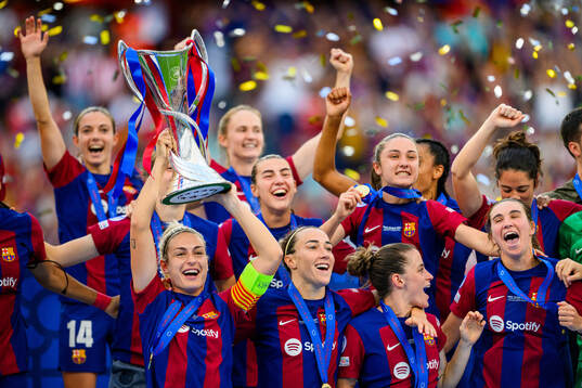 Alexia Putellas of Barcelona lifts the trophy