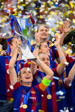 Alexia Putellas of Barcelona lifts the trophy