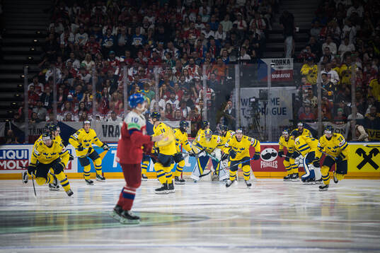 Goaltender Filip Gustavsson of Sweden with team mates