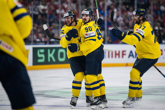 Erik Karlsson, Marcus Johansson and Victor Hedman of Sweden