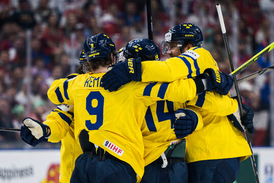 Marcus Johansson of Sweden celebrates with team mates