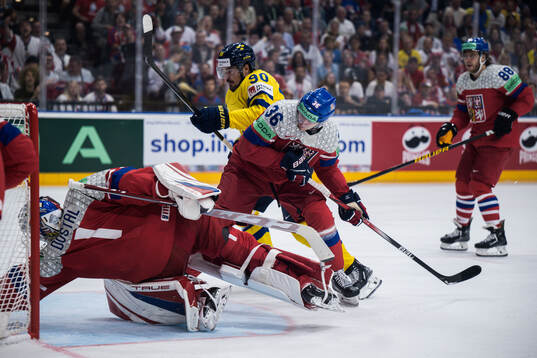 Marcus Johansson of Sweden against Lukas Dostal and Jakub