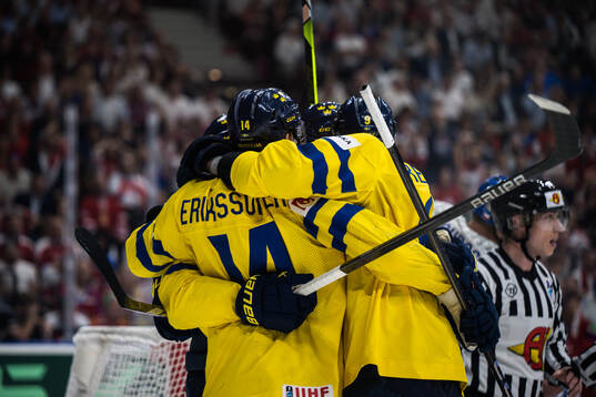 Marcus Pettersson of Sweden celebrates with team mates