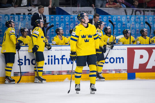 Rasmus Dahlin of Sweden looks dejected