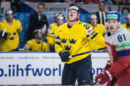 Rasmus Dahlin of Sweden looks dejected
