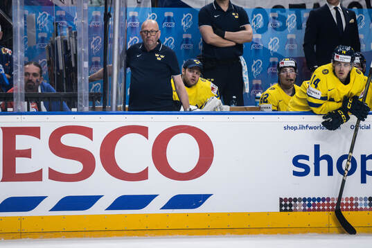 Goaltender Filip Gustavsson of Sweden looks dejected