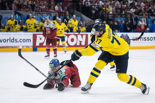 Victor Hedman of Sweden and Ondrej Kase of Czech Republic