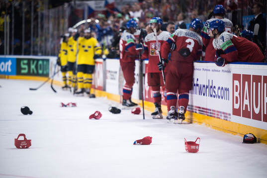 Hats are thrown onto the ice