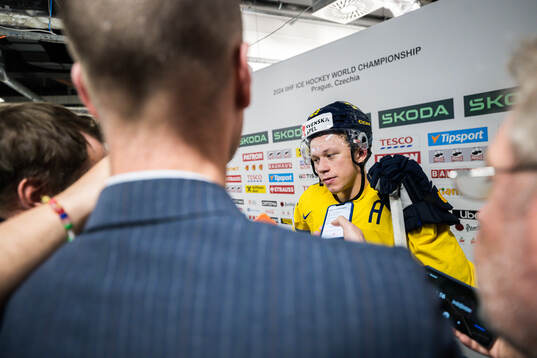 Lucas Raymond of Sweden looks dejected in mixed zone
