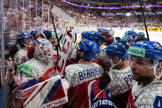 The players of Czech Republic celebrate with goaltender