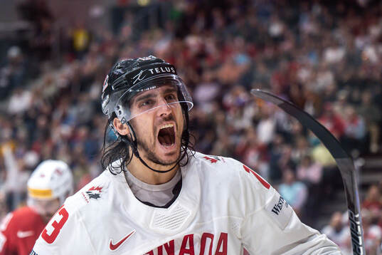 Brandon Tanev of Canada celebrates the 1-2 goal