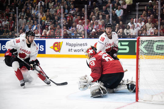 Brandon Hagel and Dawson Mercer of Canada against