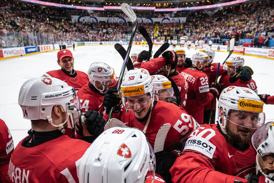 Dario Simion of Switzerland celebrate with teammates