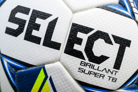 Selects logotyp på en fotboll